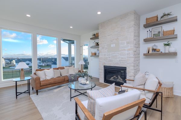 Living room with stone fireplace