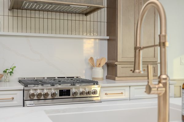 Professional-grade range and gold faucet
