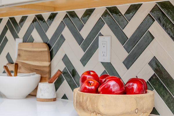 Herringbone tile backsplash in the pantry