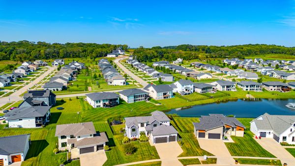 Aerial view with neighborhood pond