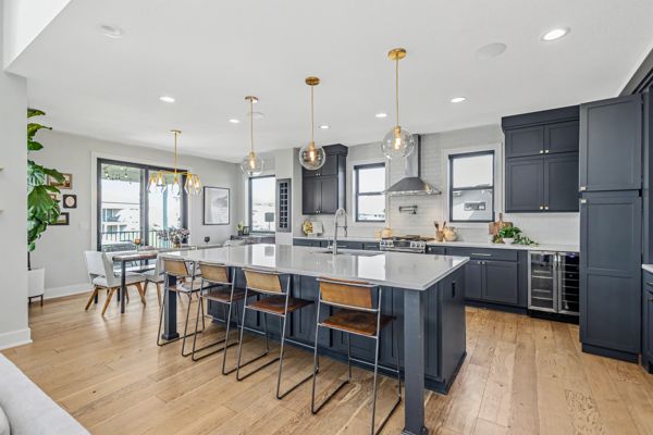 Kitchen island with gold pendant lights