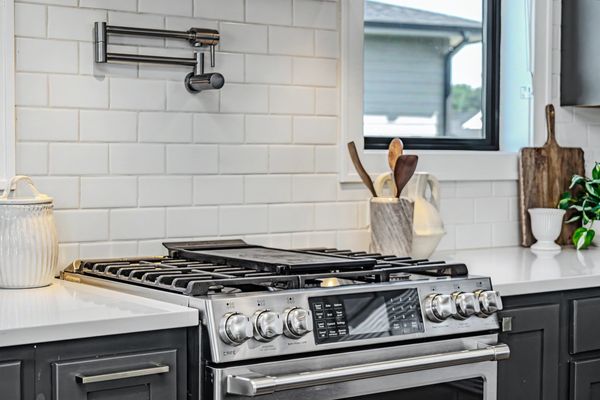 Gas range with pot filler