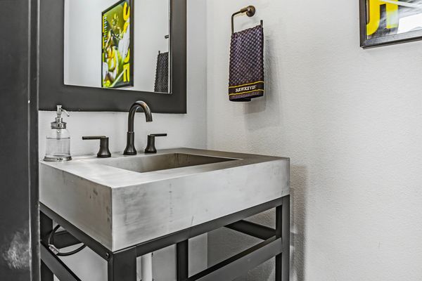 Half bath with concrete sink